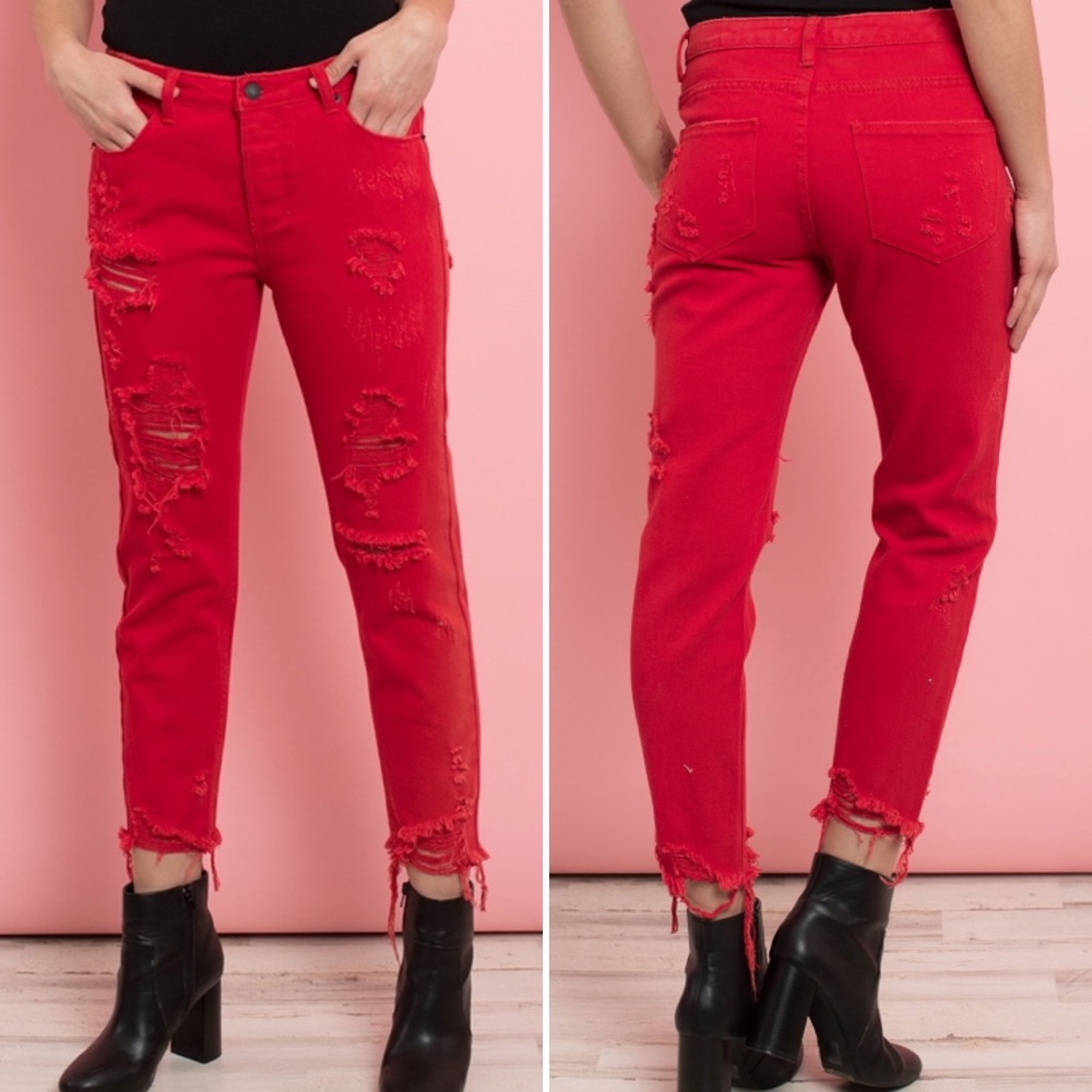 Distressed red jeans with holes/rips very trendy!